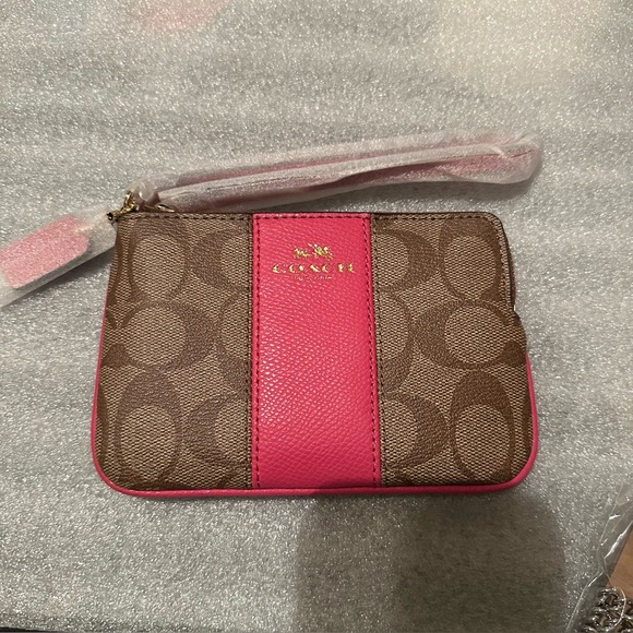 Coach Handbags - NWT Coach Signature Brown and Pink Wristlet
